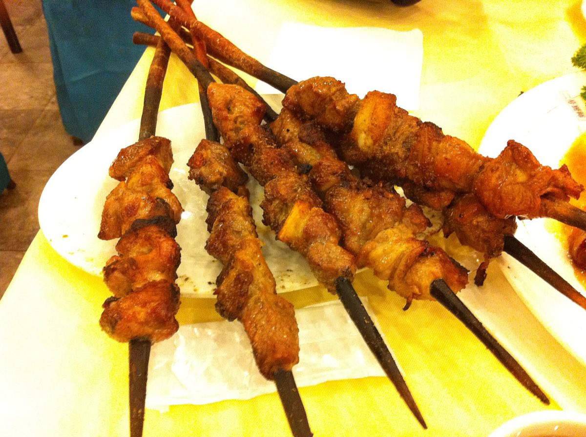 Grilled lamb skewers, a Xinjiang staple eaten in Guangzhou